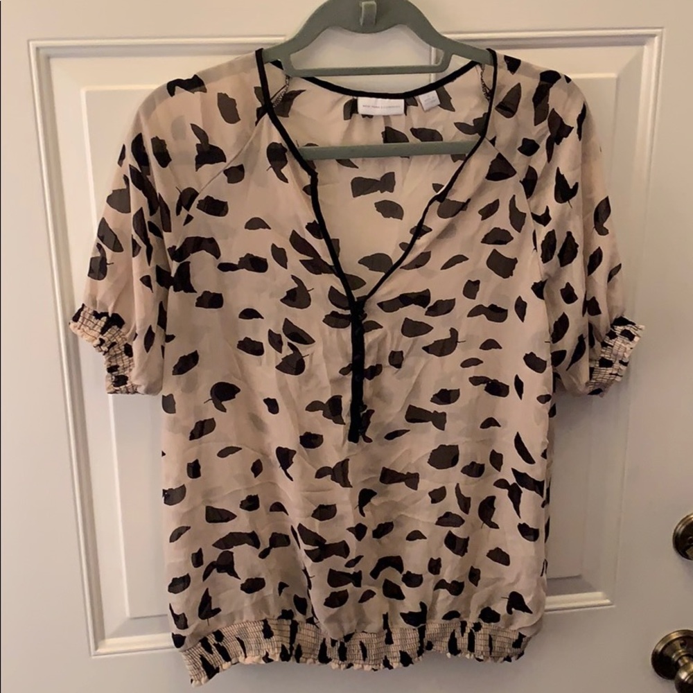 Tan and black patterned blouse